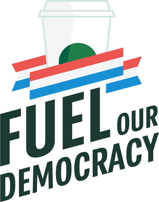 A Starbucks cup with the words Fuel Our Democracy below it.